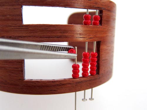 Pins un krelles